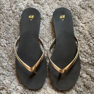 H&M Black and Gold Flip Flops Sandals